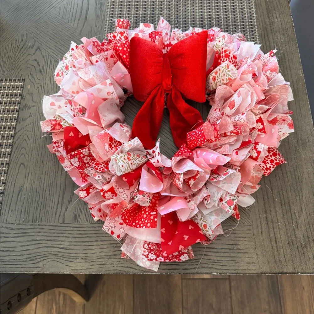 Charming Heart-Shaped Red and Pink Holiday Wreath
